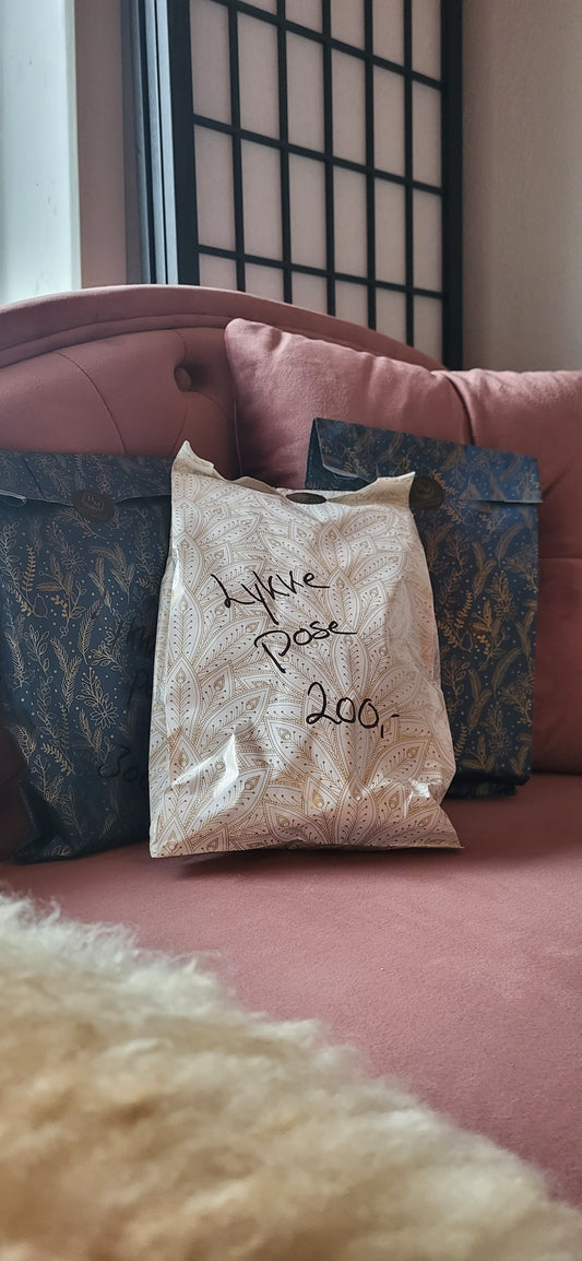 Lykkepose, 300 kr.